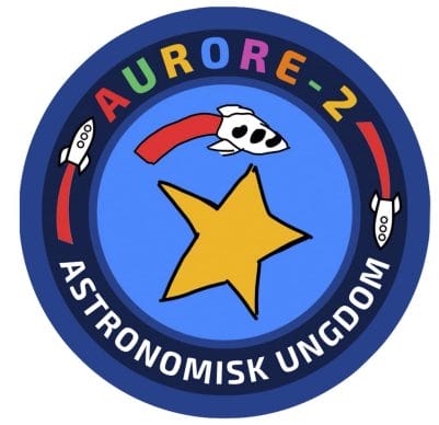 Tygknapp Aurore-2. Märket har tagits fram av barn på lågstadiet och mellanstadiet. 
